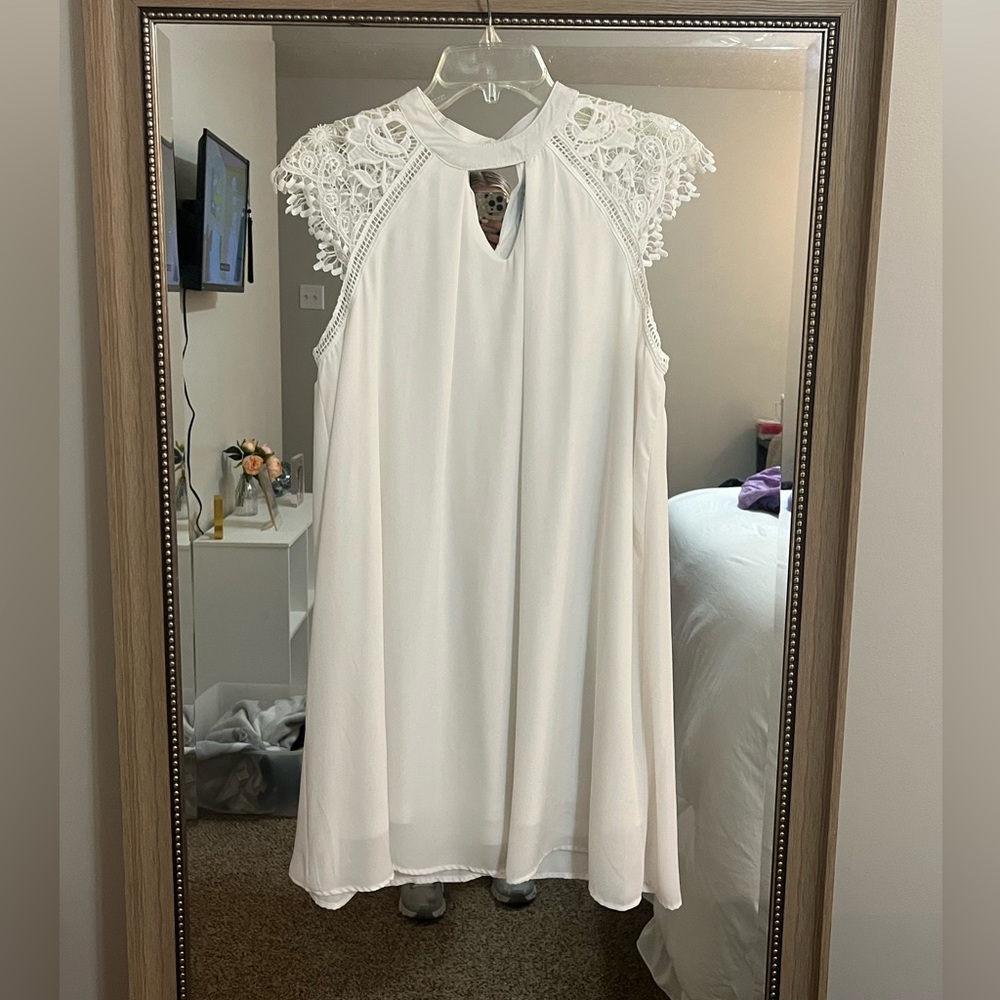 White dress with lace shoulder detail